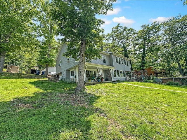 15157 Bass Cove Rd, Gravois Mills, MO 65037 - rear view of property featuring a yard
