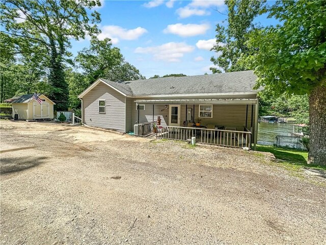 15157 Bass Cove Rd, Gravois Mills, MO 65037 - view of front of property with a shingled roof