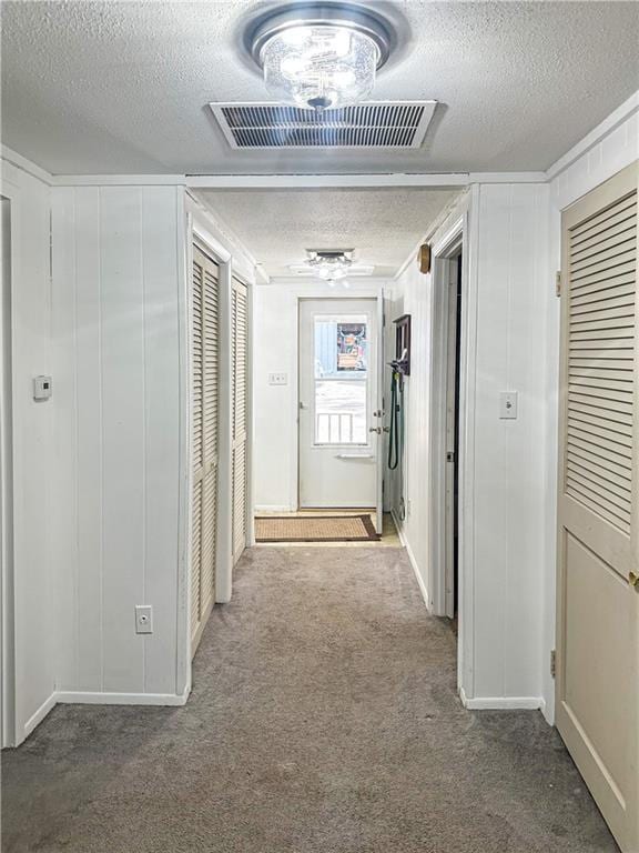 15157 Bass Cove Rd, Gravois Mills, MO 65037 - hallway with a textured ceiling and carpet floors
