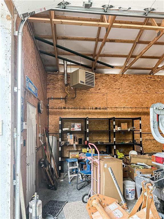 15157 Bass Cove Rd, Gravois Mills, MO 65037 - garage with a heating unit