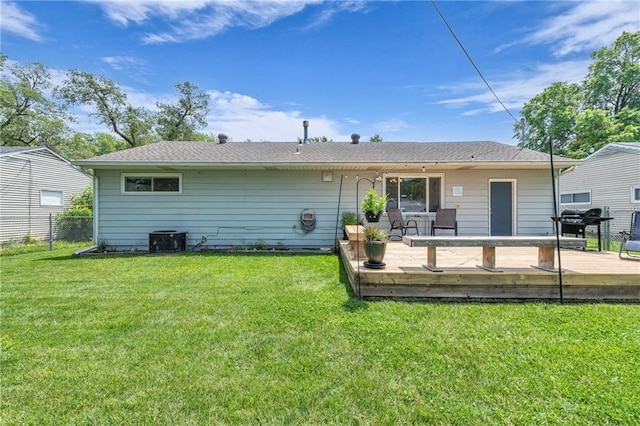 7316 E 109th St, Kansas City, MO 64134 - rear view of house with a wooden deck and central AC