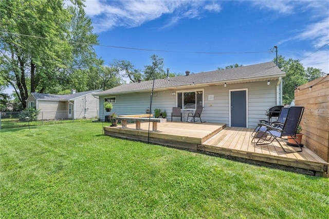 7316 E 109th St, Kansas City, MO 64134 - rear view of property with a wooden deck