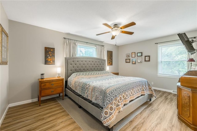 8726 W 104th St, Overland Park, KS 66212 - bedroom featuring light wood-style floors, baseboards, and ceiling fan