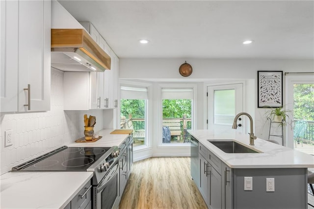 8726 W 104th St, Overland Park, KS 66212 - kitchen featuring a sink, appliances with stainless steel finishes, premium range hood, gray cabinetry, and recessed lighting