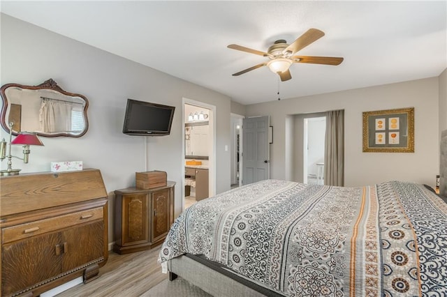 8726 W 104th St, Overland Park, KS 66212 - bedroom featuring ensuite bathroom, light wood-style floors, and a ceiling fan
