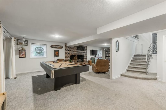 8726 W 104th St, Overland Park, KS 66212 - recreation room with carpet flooring, a fireplace, billiards table, baseboards, and a textured ceiling