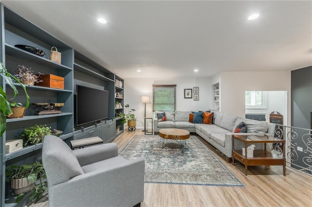 8726 W 104th St, Overland Park, KS 66212 - living room with light wood-style flooring, healthy amount of natural light, and recessed lighting