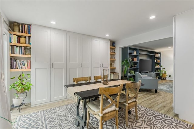 8726 W 104th St, Overland Park, KS 66212 - dining space with light wood-style floors and recessed lighting
