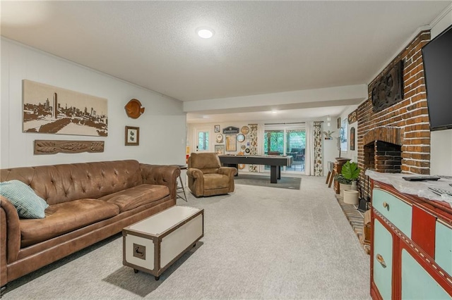 8726 W 104th St, Overland Park, KS 66212 - carpeted living area with billiards, a textured ceiling, and a fireplace