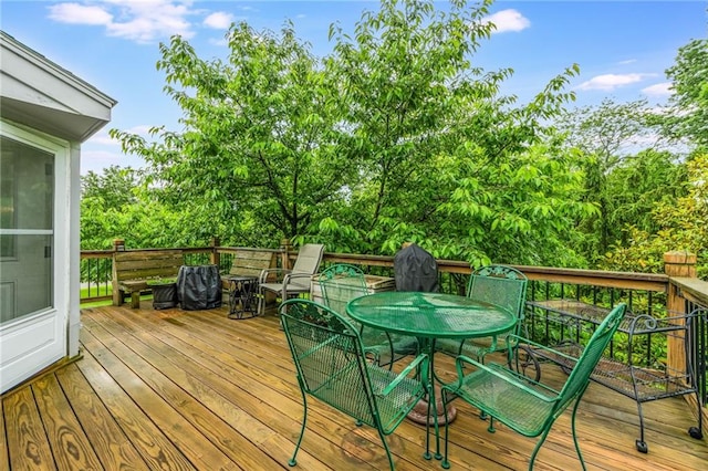 8726 W 104th St, Overland Park, KS 66212 - wooden terrace featuring outdoor dining space