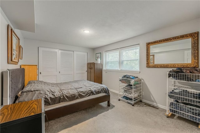 8726 W 104th St, Overland Park, KS 66212 - carpeted bedroom featuring baseboards and a closet