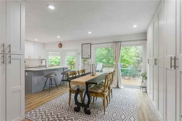 8726 W 104th St, Overland Park, KS 66212 - dining space featuring light wood-type flooring and recessed lighting