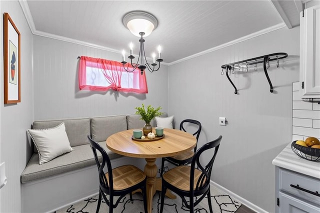 7 NW 88th St, Kansas City, MO 64155 - dining room with breakfast area, a chandelier, crown molding, and baseboards
