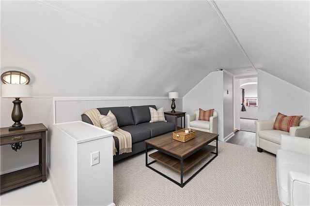 7 NW 88th St, Kansas City, MO 64155 - living room with vaulted ceiling, arched walkways, and wood finished floors