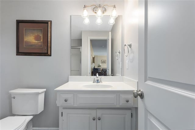 8108 NE 113th St, Kansas City, MO 64157 - bathroom with vanity and a chandelier