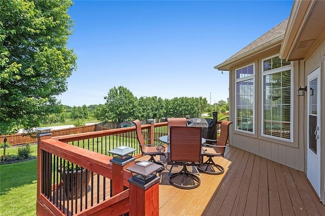 8108 NE 113th St, Kansas City, MO 64157 - wooden terrace featuring outdoor dining area and a fenced backyard