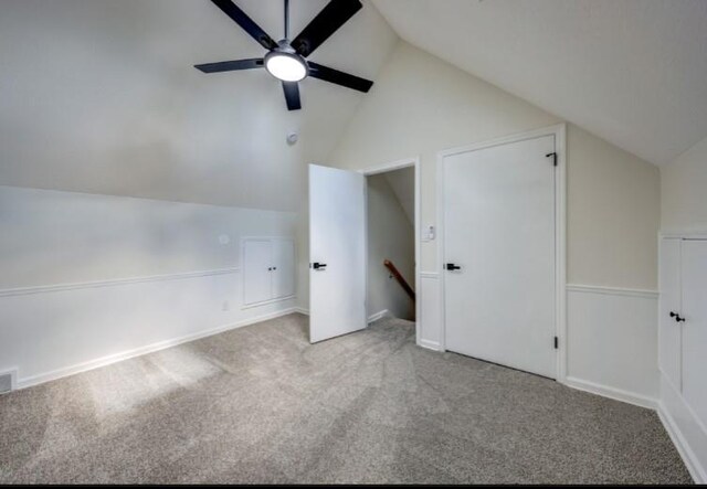 10409 Russell St, Overland Park, KS 66212 - additional living space with lofted ceiling, a ceiling fan, and carpet flooring