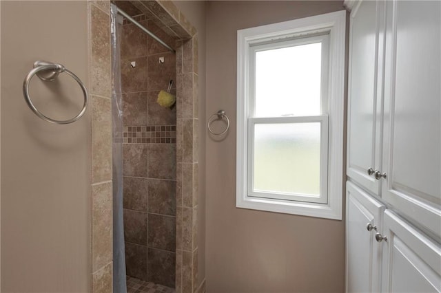 130 SW 95th Rd, Warrensburg, MO 64093 - bathroom with tiled shower and healthy amount of natural light
