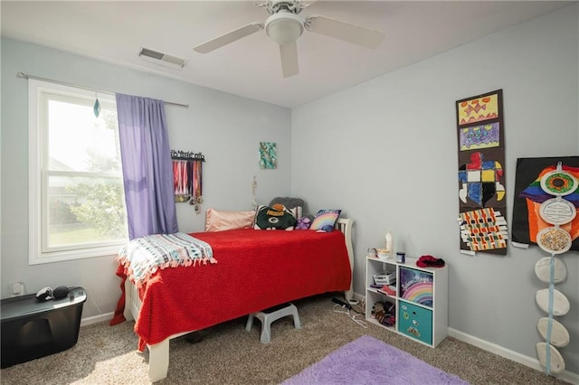 130 SW 95th Rd, Warrensburg, MO 64093 - bedroom with carpet floors, baseboards, and a ceiling fan