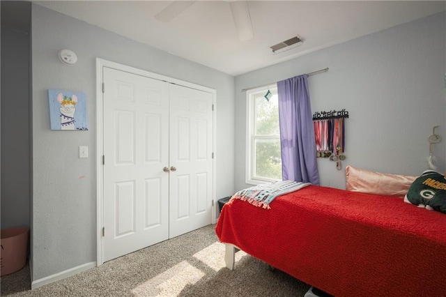 130 SW 95th Rd, Warrensburg, MO 64093 - bedroom featuring carpet flooring, a closet, a ceiling fan, and baseboards