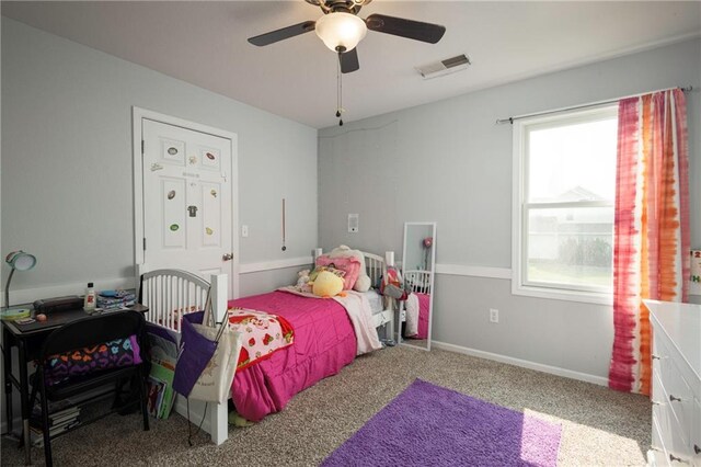 130 SW 95th Rd, Warrensburg, MO 64093 - carpeted bedroom with ceiling fan