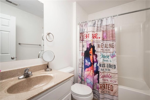 130 SW 95th Rd, Warrensburg, MO 64093 - bathroom with vanity, toilet, and shower / bath combo