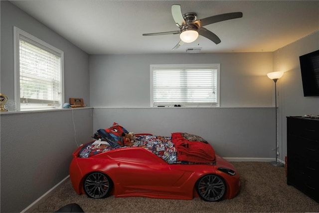 130 SW 95th Rd, Warrensburg, MO 64093 - bedroom with carpet flooring, baseboards, and ceiling fan
