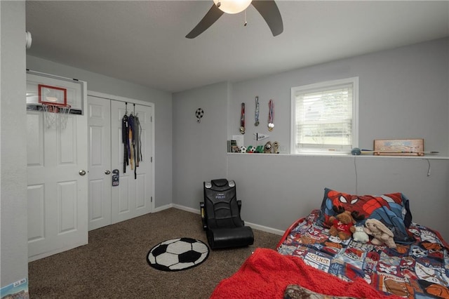 130 SW 95th Rd, Warrensburg, MO 64093 - bedroom featuring carpet, a ceiling fan, baseboards, and a closet