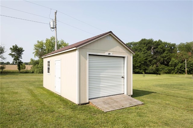 130 SW 95th Rd, Warrensburg, MO 64093 - garage featuring a shed
