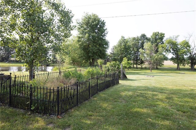 130 SW 95th Rd, Warrensburg, MO 64093 - view of yard with a water view