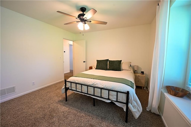 17586 W 112th St, Olathe, KS 66061 - carpeted bedroom featuring a ceiling fan and baseboards