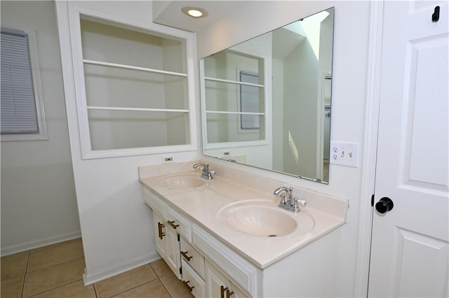 17586 W 112th St, Olathe, KS 66061 - bathroom with double vanity, tile patterned floors, and baseboards