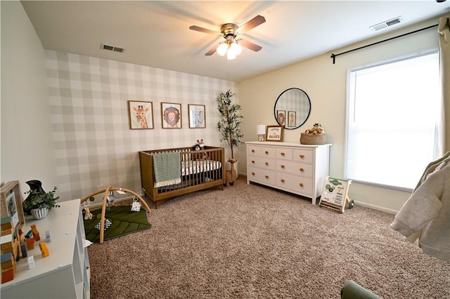17586 W 112th St, Olathe, KS 66061 - bedroom with carpet flooring, multiple windows, a crib, and wallpapered walls
