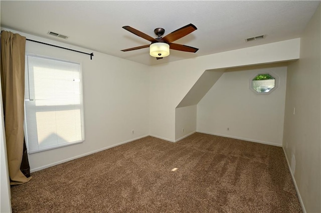 17586 W 112th St, Olathe, KS 66061 - bonus room with carpet flooring, ceiling fan, and baseboards