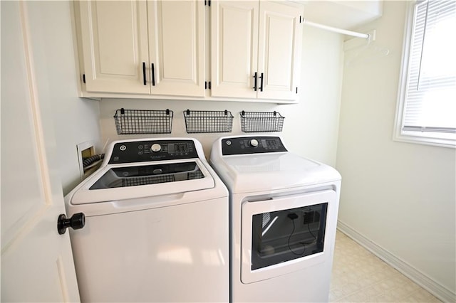 17586 W 112th St, Olathe, KS 66061 - washroom with separate washer and dryer, light flooring, cabinet space, and baseboards