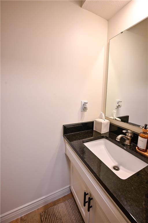17586 W 112th St, Olathe, KS 66061 - bathroom with vanity and baseboards