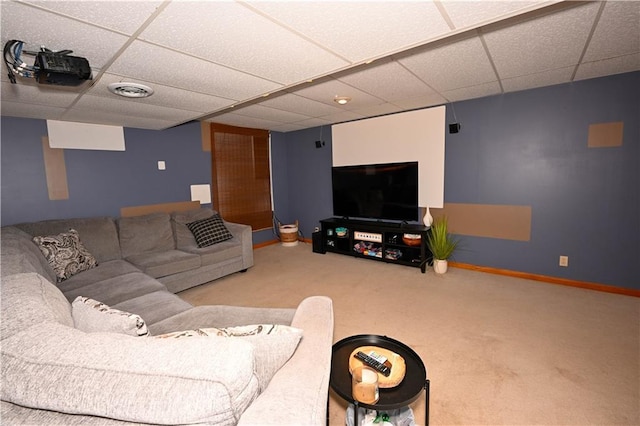 17586 W 112th St, Olathe, KS 66061 - living area featuring a paneled ceiling, carpet floors, and baseboards