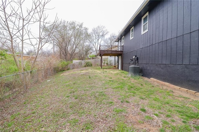 956 Ridge Dr, Warrensburg, MO 64093 - fenced backyard featuring a wooden deck