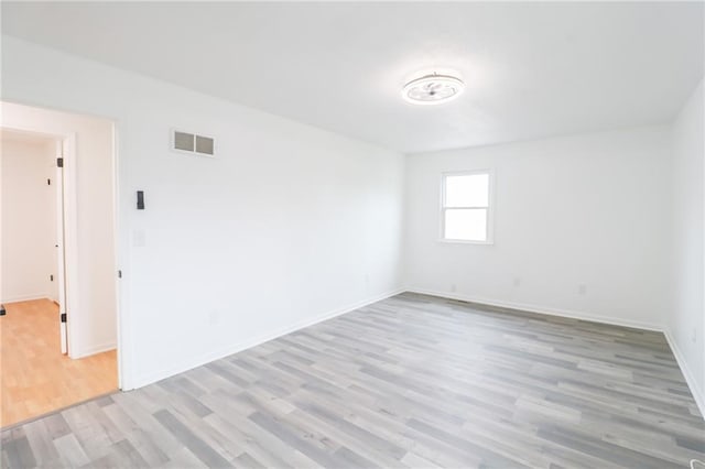 956 Ridge Dr, Warrensburg, MO 64093 - spare room featuring light wood finished floors and baseboards