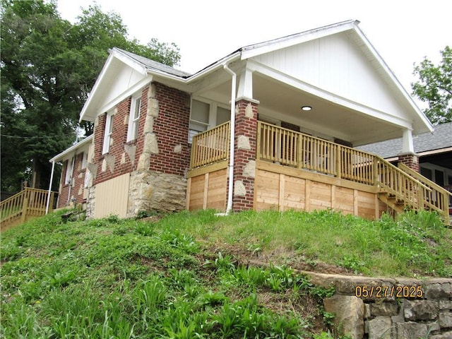 2119 N 32nd St Unit K, Kansas City, KS 66104 - view of front of property with stairs and brick siding