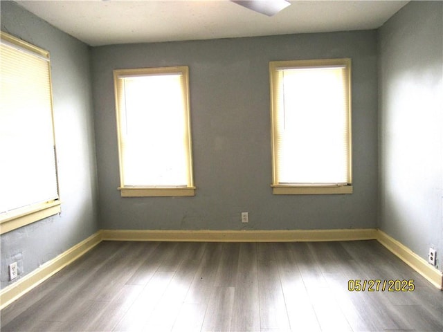 2119 N 32nd St Unit K, Kansas City, KS 66104 - empty room with wood finished floors and baseboards