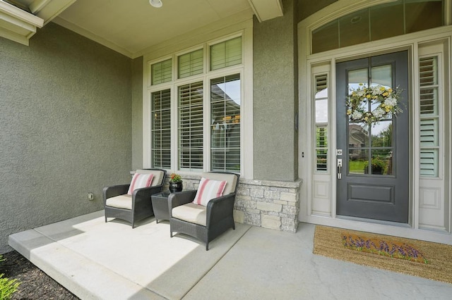 16005 Melrose St, Overland Park, KS 66221 - doorway to property featuring stucco siding, a porch, and stone siding