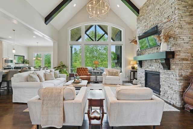 16005 Melrose St, Overland Park, KS 66221 - living room with a chandelier, high vaulted ceiling, beamed ceiling, dark wood-style flooring, and a fireplace