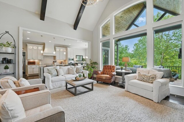 16005 Melrose St, Overland Park, KS 66221 - living area with high vaulted ceiling, beamed ceiling, and recessed lighting