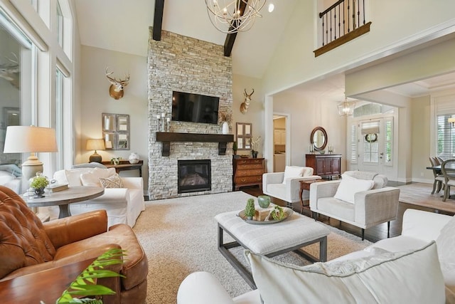 16005 Melrose St, Overland Park, KS 66221 - living area featuring high vaulted ceiling, a stone fireplace, a chandelier, and beamed ceiling