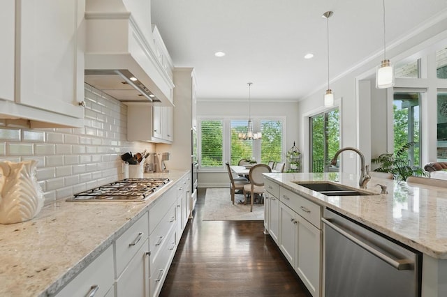 16005 Melrose St, Overland Park, KS 66221 - kitchen with appliances with stainless steel finishes, custom range hood, a chandelier, ornamental molding, and dark wood finished floors