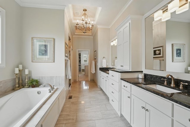 16005 Melrose St, Overland Park, KS 66221 - bathroom featuring double vanity, a chandelier, a garden tub, and crown molding