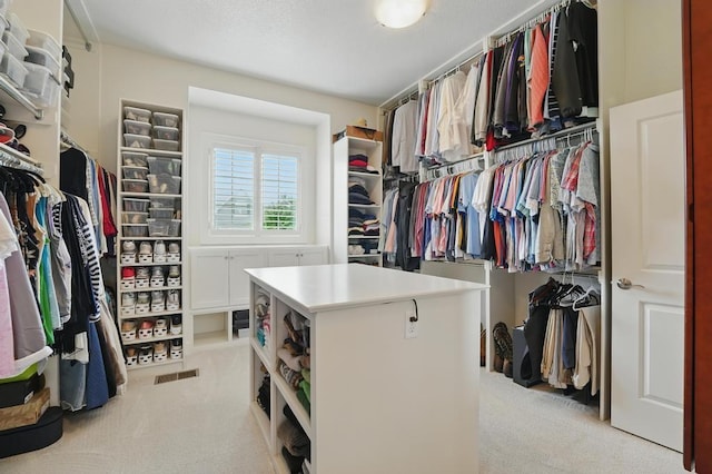 16005 Melrose St, Overland Park, KS 66221 - walk in closet featuring light carpet