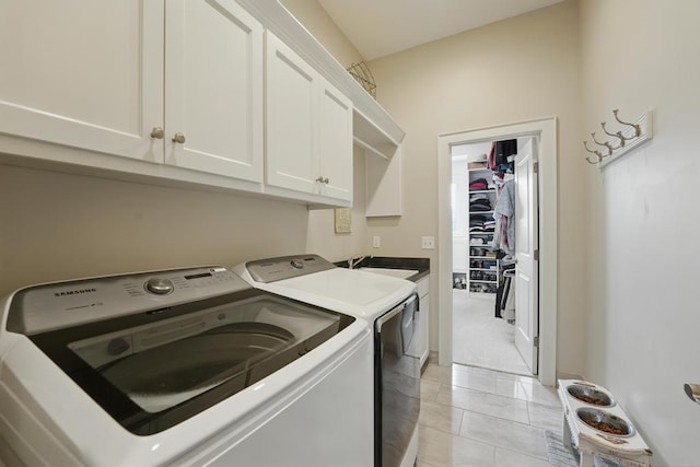 16005 Melrose St, Overland Park, KS 66221 - laundry area with cabinet space and washer and dryer