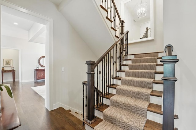 16005 Melrose St, Overland Park, KS 66221 - staircase with wood finished floors and baseboards
